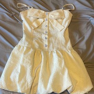 Yellow spaghetti style top